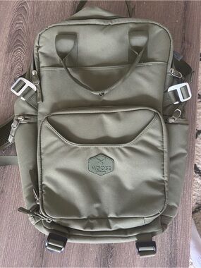 “Moose” brand Olive Green backpack. Used once.
